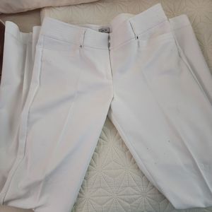 White pants by cache with tag